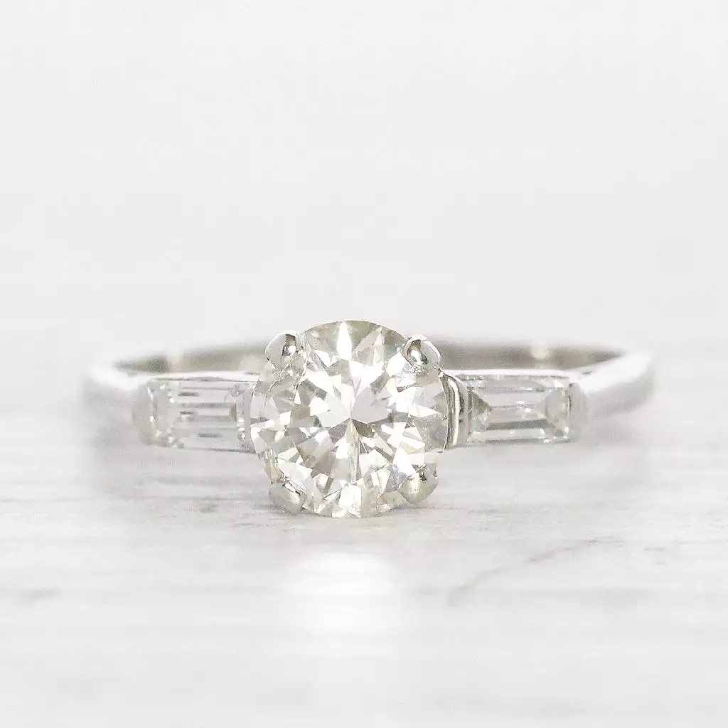 Art Deco 1 Carat Brilliant Cut Diamond Solitaire with Baguette Diamond Shoulders