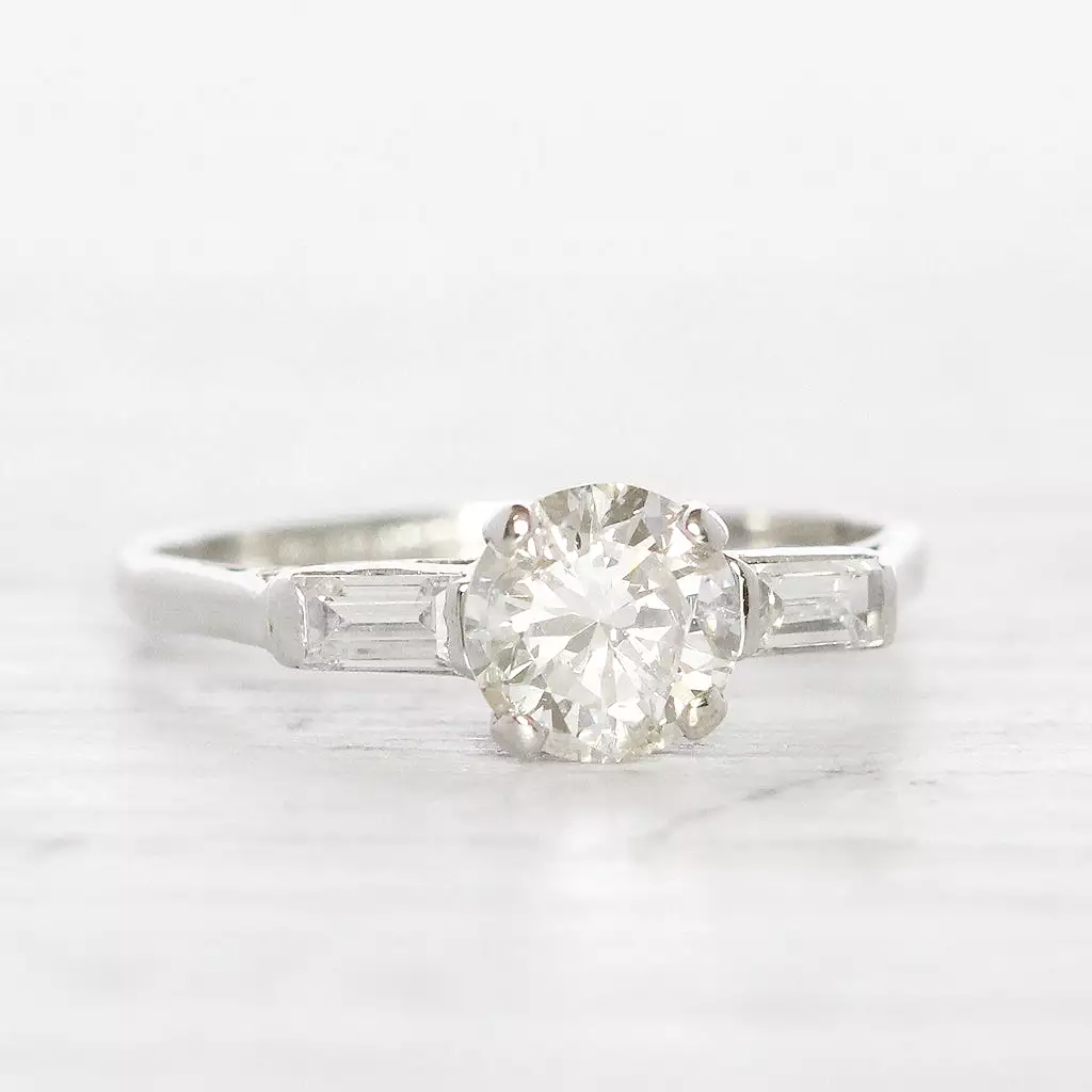 Art Deco 1 Carat Brilliant Cut Diamond Solitaire with Baguette Diamond Shoulders